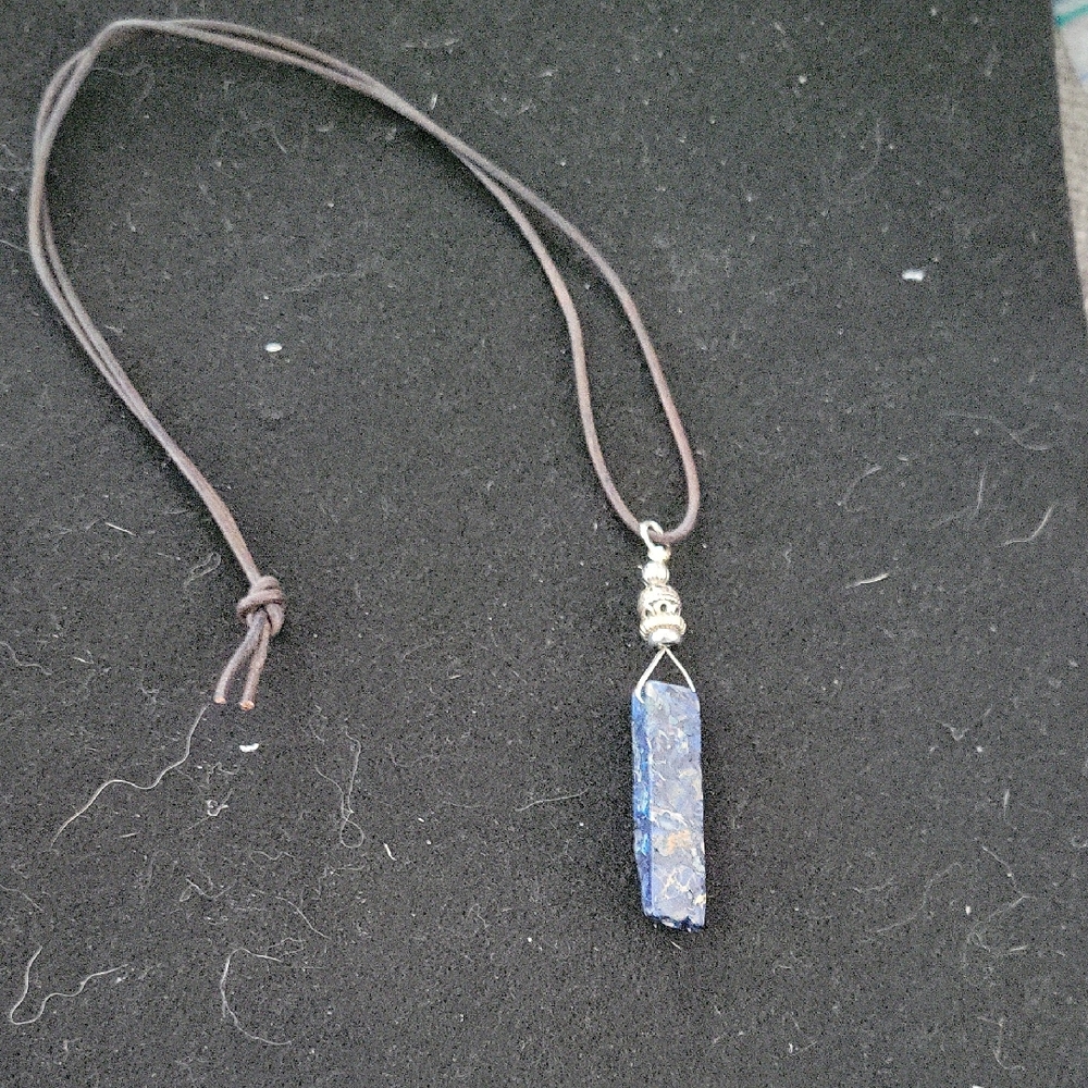Blue Crystal Point Pendant Necklace on Brown Cord